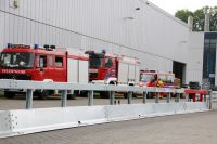 Feuerwehrautos der Feuerwehr Schmelz auf dem Gelände von Meiser Straßenausstattung in Schmelz-Limbach.